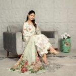 Graceful Pastel Green Floral Suit with Delicate Embroidery